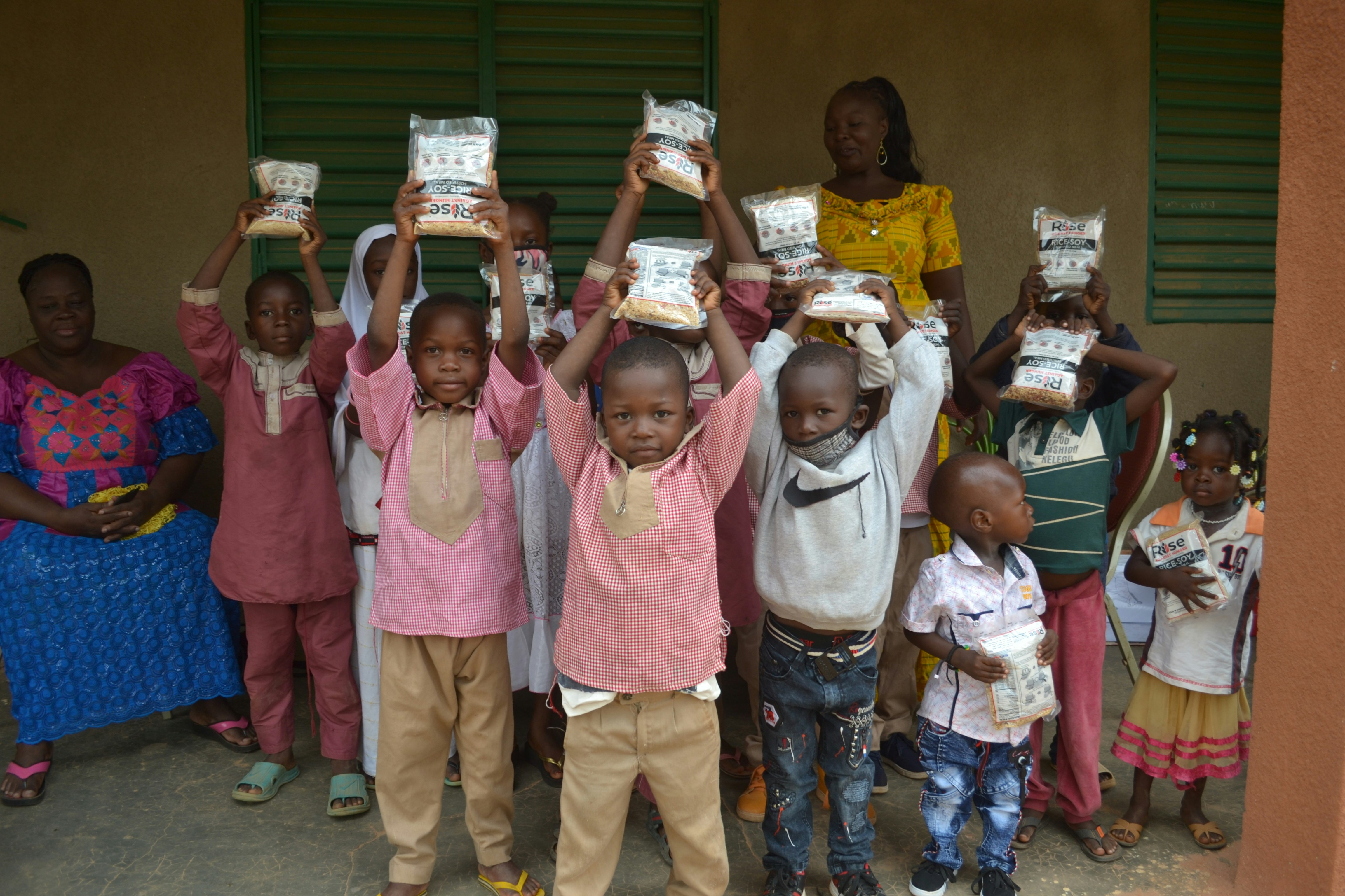 Rise Against Hunger_children holding meals