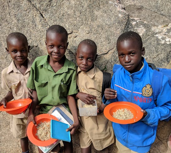 Zimbabwe kids eating a meal